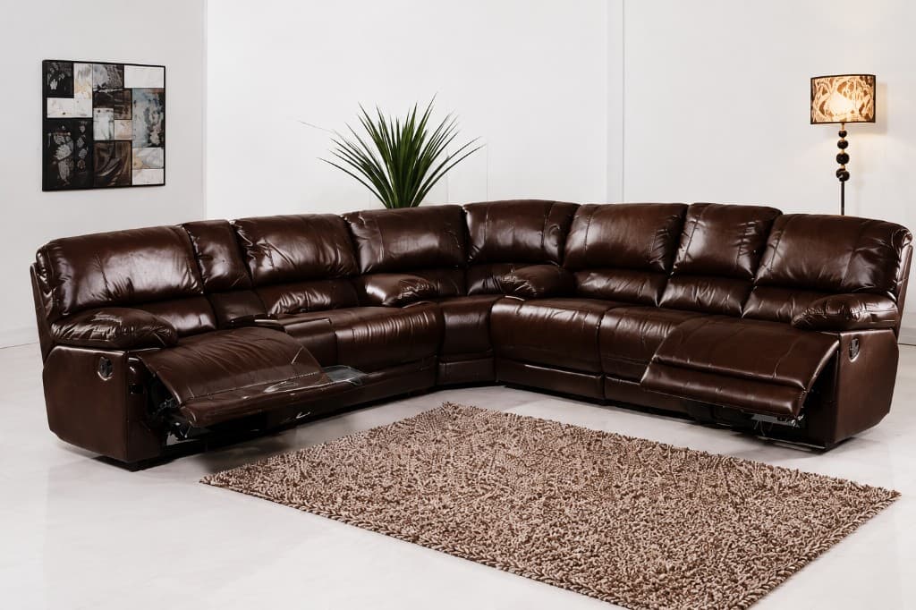 Ashworth reclining corner sofa in brown leather with both footrests extended